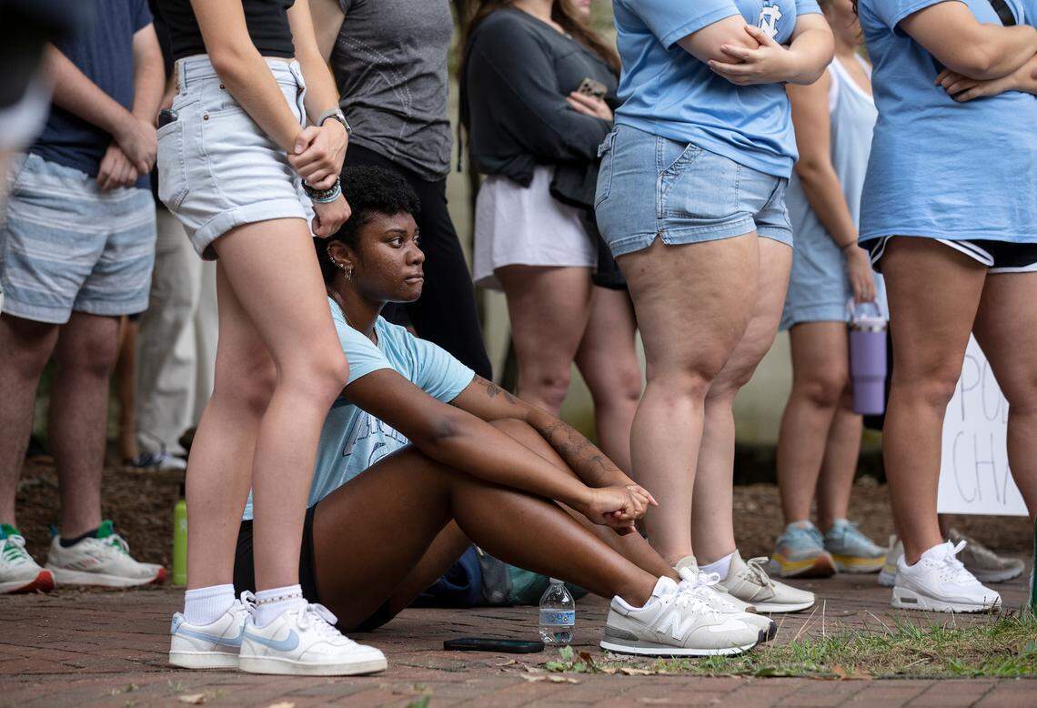 People listen during a student-led rally at UNC-Chapel Hill in support of gun control on Wednesday, Aug. 30, 2023. A graduate student has been charged with first-degree murder following a Monday shooting that left a faculty member dead on the university’s campus.