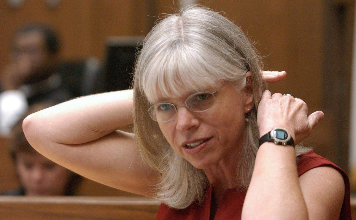 Dr. Deborah Radisch, MD, associate chief medical examiner for the state of North Carolina indicates to the Peterson trial jury Thursday am the angle and location of trauma found at the back of the head and neck of the late Kathleen Peterson (Cq). Dr. Radisch was on the witness stand all day for the 40th day of the Michael Peterson murder trial.