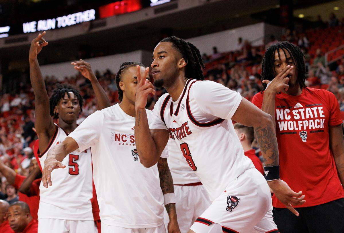 N.C. State’s Jayden Taylor reacts after making a three-point basket during the second half of the Wolfpack’s 81-72 win over Presbyterian on Friday, Nov. 8, 2024, at Lenovo Center in Raleigh, N.C.