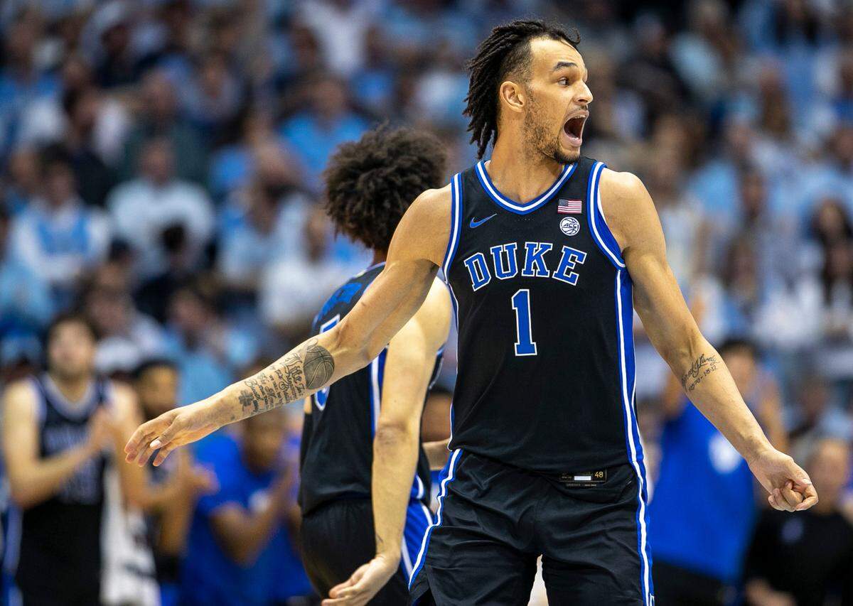 Duke’s Dereck Lively II (1) reacts after a dunk to tie the score 49-49 against North Carolina in the second half on Saturday, March 4, 2023 at the Smith Center in Chapel Hill, N.C.