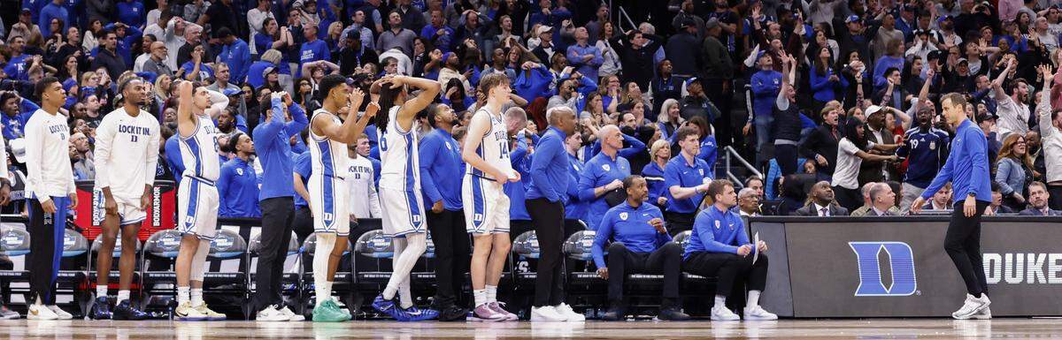 The Duke bench reacts after UConn’s Braylon Mullins made a three-pointer with a second left during UConn’s 73-72 victory over Duke in the NCAA Mens’ Tournament East Regional Final at Capital One Arena in Washington, D.C., Sunday, March 29, 2026.