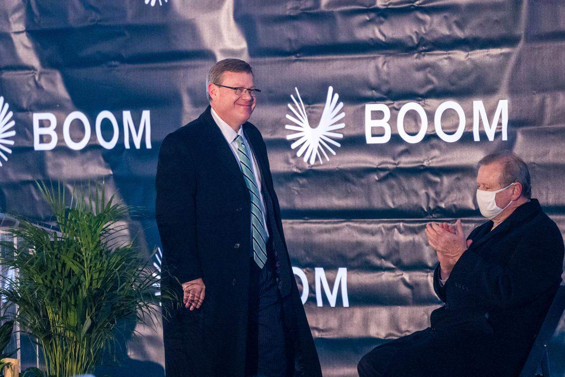 House Speaker Tim Moore finishes his remarks as Senate President Pro Tempore Phil Berger applauds during a press conference Wednesday, Jan. 26, 2022 at Greensboro’s Piedmont Triad International announcing Boom Supersonic’s plans to build a $500 million “flagship” production facility at the airport that is expected to create more than 1,750 jobs.