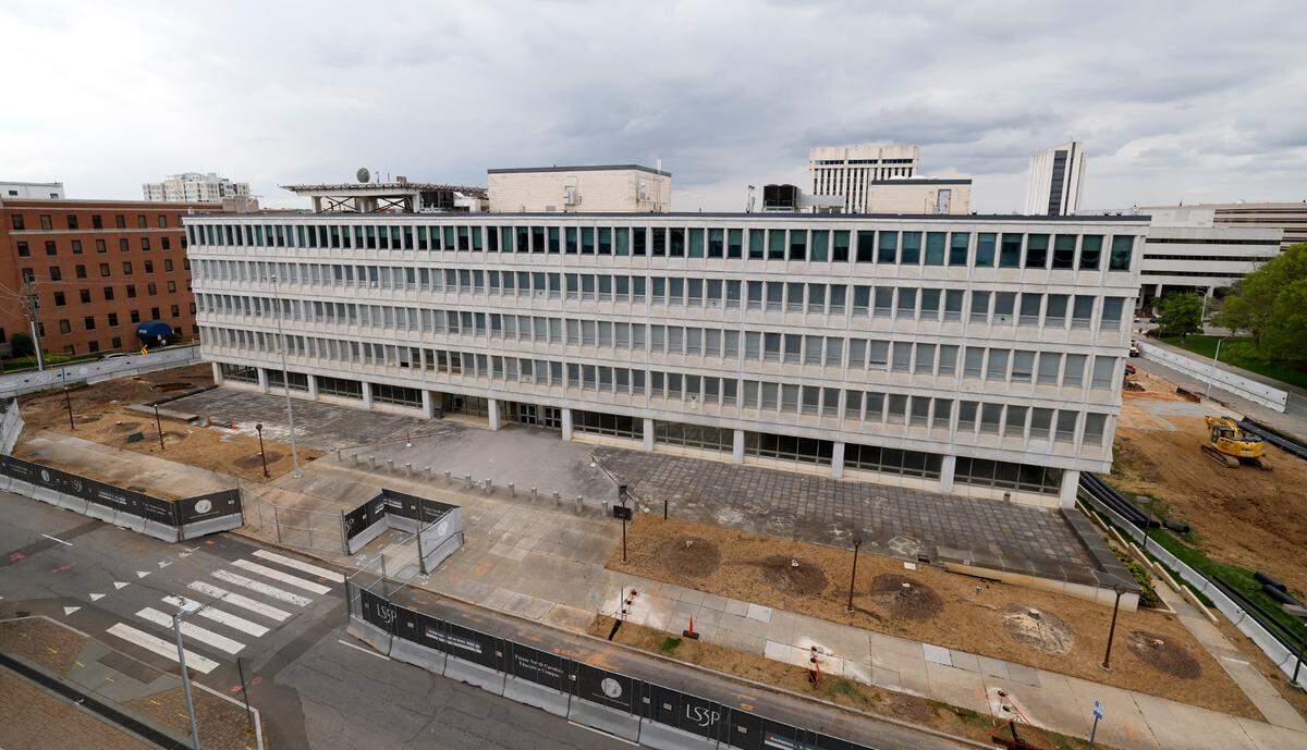 The Department of Administration building on Jones Street in Raleigh, N.C., photographed Wednesday, April 10, 2024. The building previously housed the Department of Administration, Governor’s Office and other state government offices. It is set to be demolished in late 2024 and replaced with a new Education Campus. A lane of traffic is blocked while chiller work is done in early April 2024 along Jones Street in downtown Raleigh.