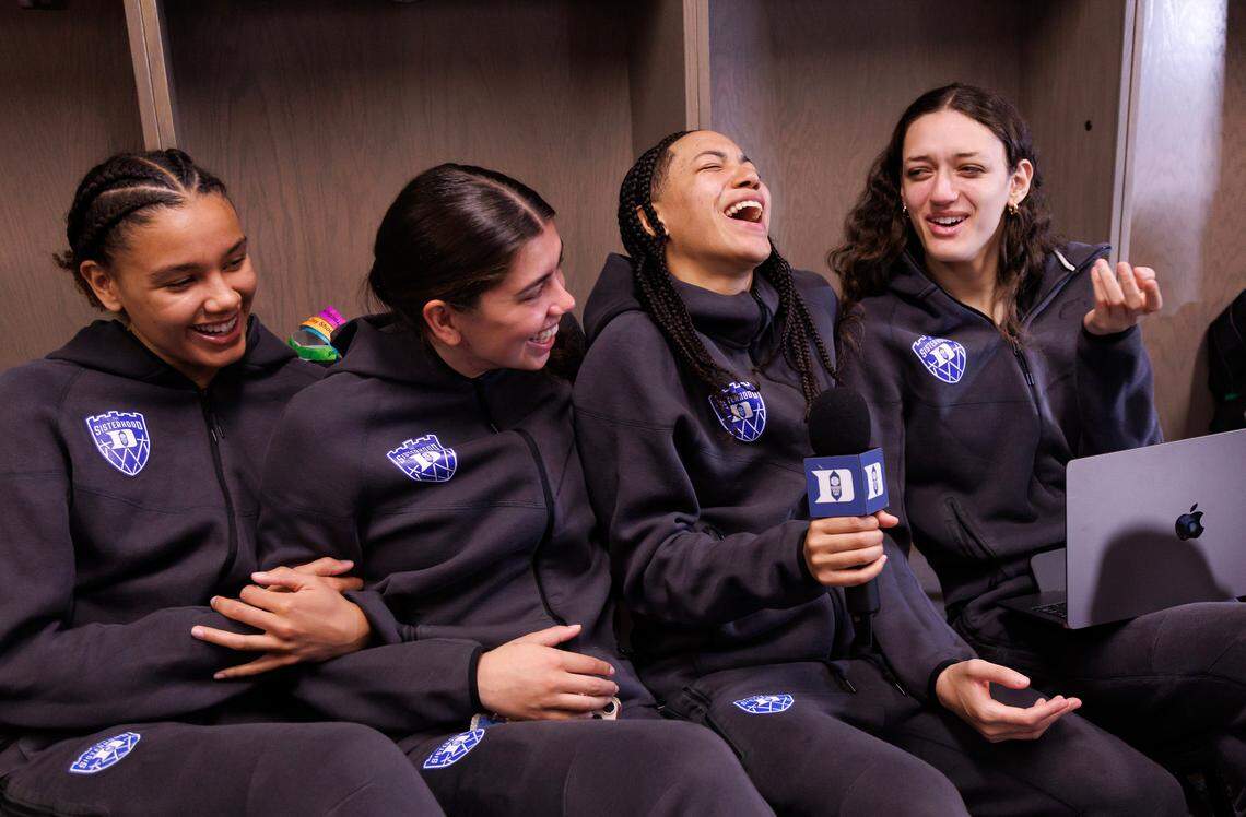 Duke’s Taina Mair laughs while interviewing teammates Delaney Thomas, Emma Koabel and Jordan Wood in the locker room at Legacy Arena on Saturday, March 29, 2025, in Birmingham, Ala. Duke will face South Carolina in the NCAA Tournament Elite Eight on Sunday.