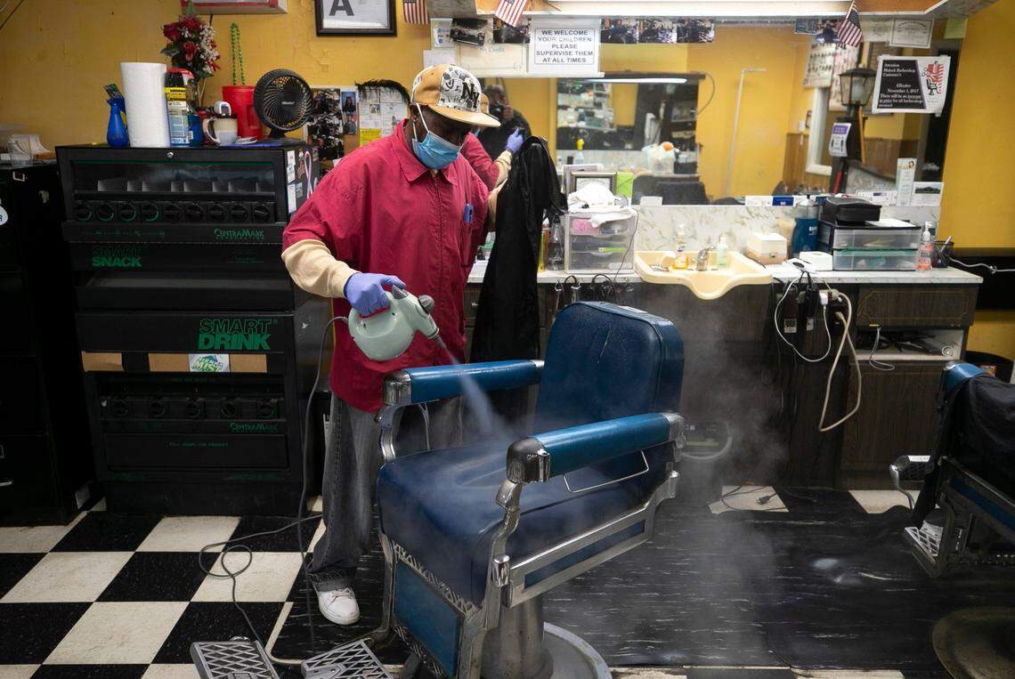 Barber Joe Martin cleans his chair as he prepares for a new customer at Blalock’s Barber Salon on S. Wilmington Street on Thursday, September 17, 2020 in Raleigh, N.C.