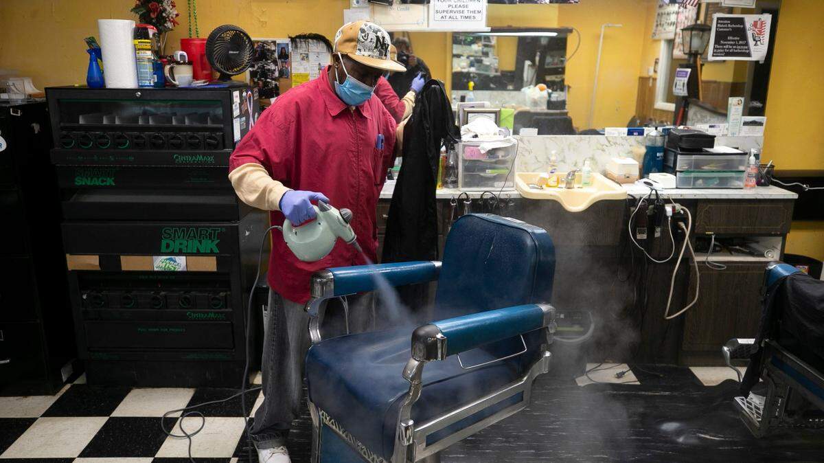Barber Joe Martin cleans his chair as he prepares for a new customer at Blalock’s Barber Salon on S. Wilmington Street on Thursday, September 17, 2020 in Raleigh, N.C. A new program offers coaching to small businesses.