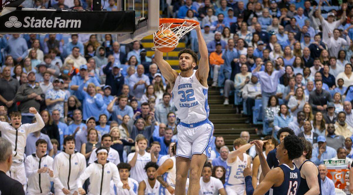 North Carolina’s Pete Nance (32) gets a dunk during the second half against Virginia on Saturday, February 25, 2023 at the Smith Center in Chapel Hill, N.C. Nance lead all scores with 22 points in the Tar Heels’ 71-63 victory.