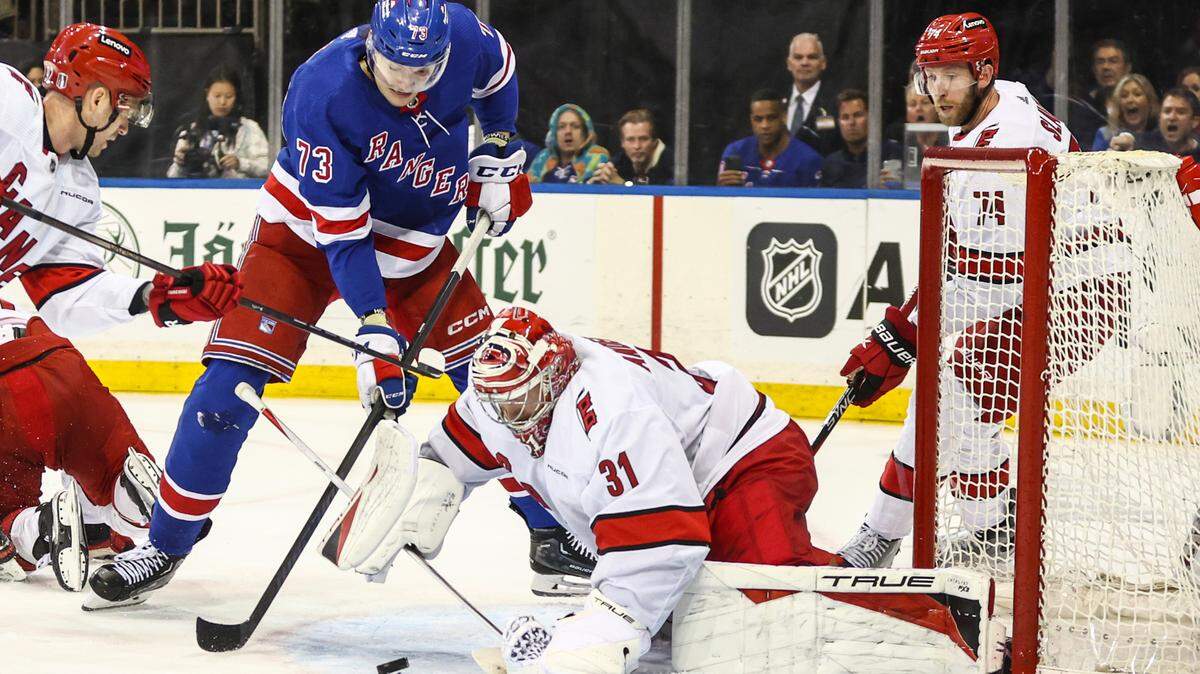 May 5, 2024; New York, New York, USA; Carolina Hurricanes goaltender Frederik Andersen (31) makes a save on a shot on goal attempt by New York Rangers center Matt Rempe (73) in the second period in game one of the second round of the 2024 Stanley Cup Playoffs at Madison Square Garden. Mandatory Credit: Wendell Cruz-USA TODAY Sports