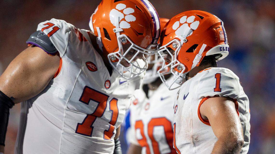 Clemson’s Tristan Leigh (71) congratulates Will Shipley (1) after scoring on a two-yard pass completion in the second quarter against Duke on Monday, September 4, 2023 at Wallace Wade Stadium Stadium in Durham, N.C.