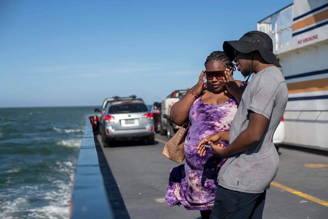 Nazir Jones and Nahjae Chapman of Kannapolis, N.C. ride the Cape Point Ferry from Hatteras to Ocracoke in July 2021.