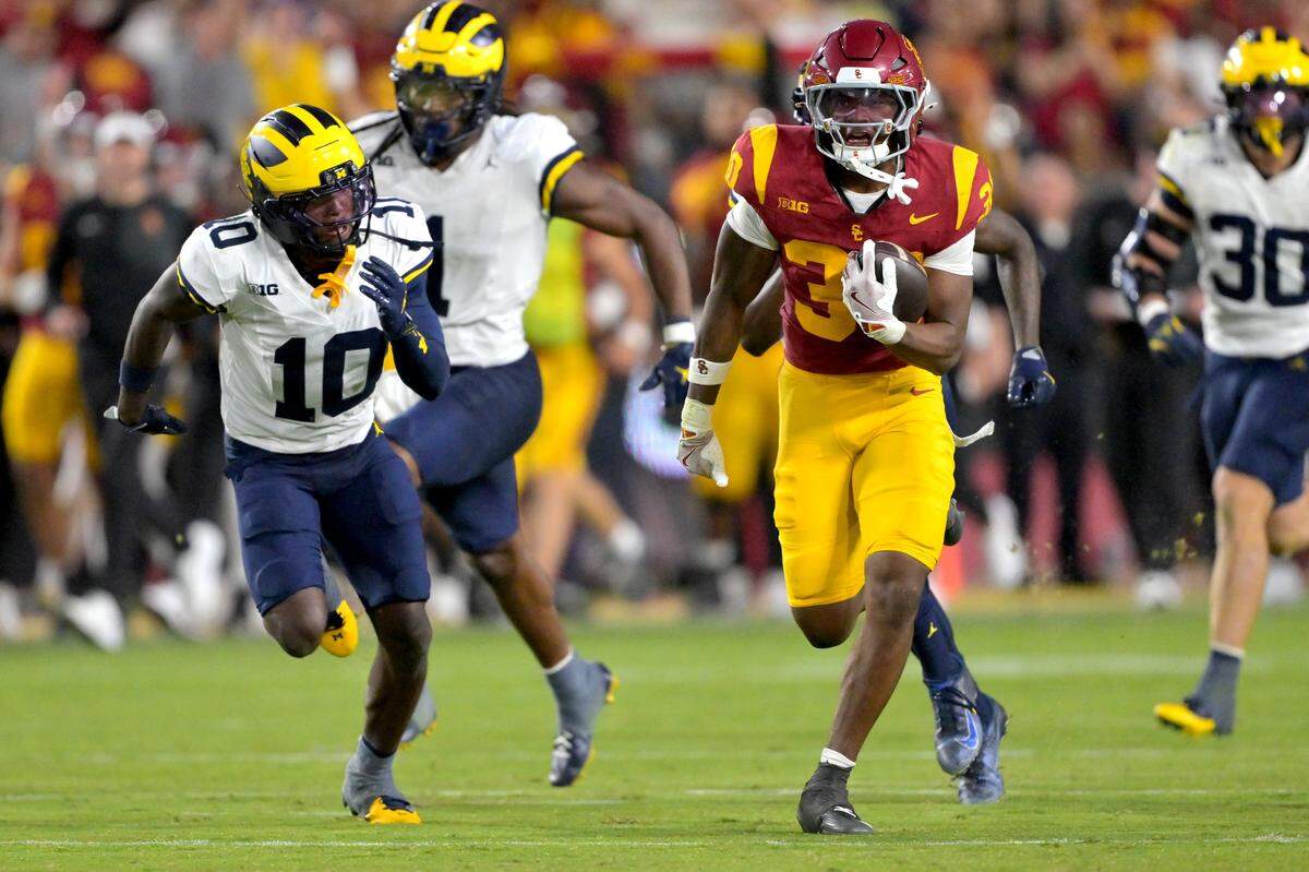 Oct 11, 2025; Los Angeles, California, USA; USC Trojans running back King Miller (30) runs to the 19-yard line in the second half against the Michigan Wolverines at United Airlines Field at the Los Angeles Memorial Coliseum. Mandatory Credit: Jayne Kamin-Oncea-Imagn Images