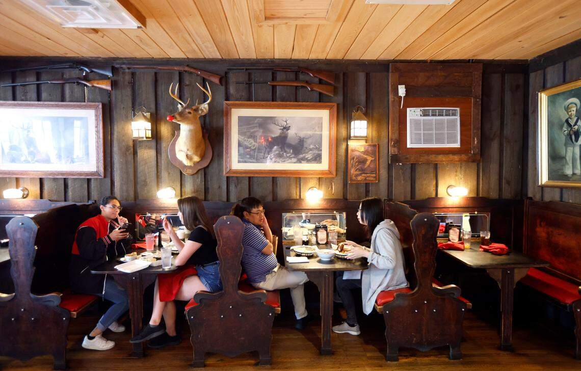 Patrons eat lunch at Mitch’s Tavern on Hillsborough Street in Raleigh, N.C., Wednesday, August 24, 2022.