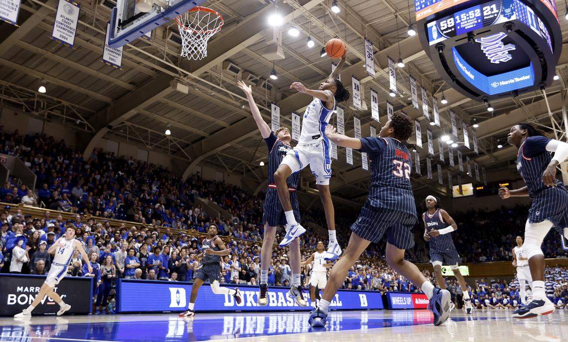 Duke’s Isaiah Evans (3) heads in to slam in two in the second half of Duke’s 93-56 victory over Howard at Cameron Indoor Stadium in Durham, N.C., Sunday, Nov. 23, 2025.