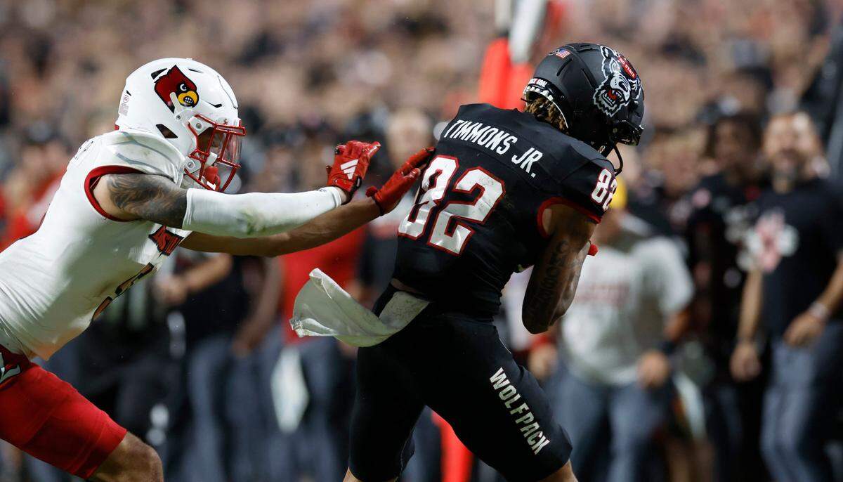 N.C. State wide receiver Terrell Timmons Jr. (82) makes the reception during the first half of N.C. State’s game against Louisville at Carter-Finley Stadium in Raleigh, N.C., Friday, Sept. 29, 2023.