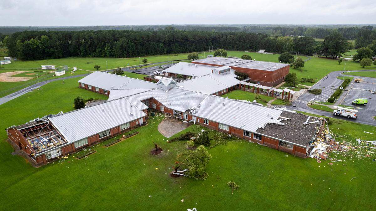 Sections of roof are missing from Springfield Middle School in the Lucama area of Wilson County where a tornado damaged the school and at least 10 homes as bands from Tropical Storm Debbie moved through the area on Thursday, Aug. 8, 2024. At least one person is dead as a result of the tornado.