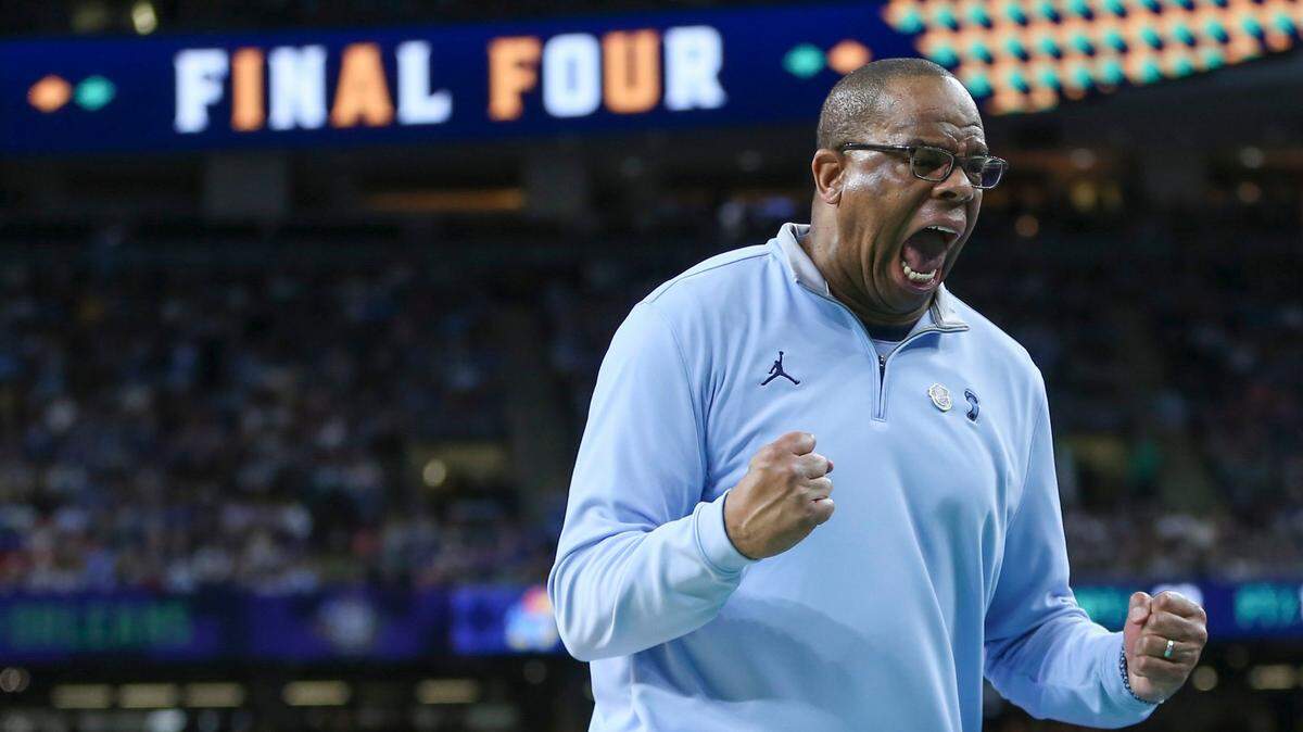 North Carolina head coach Hubert Davis yells as the Tar Heels erase a first half deficit and race to a 16 point lead during the first half of the national championship game at the Superdome in New Orleans on Monday night.