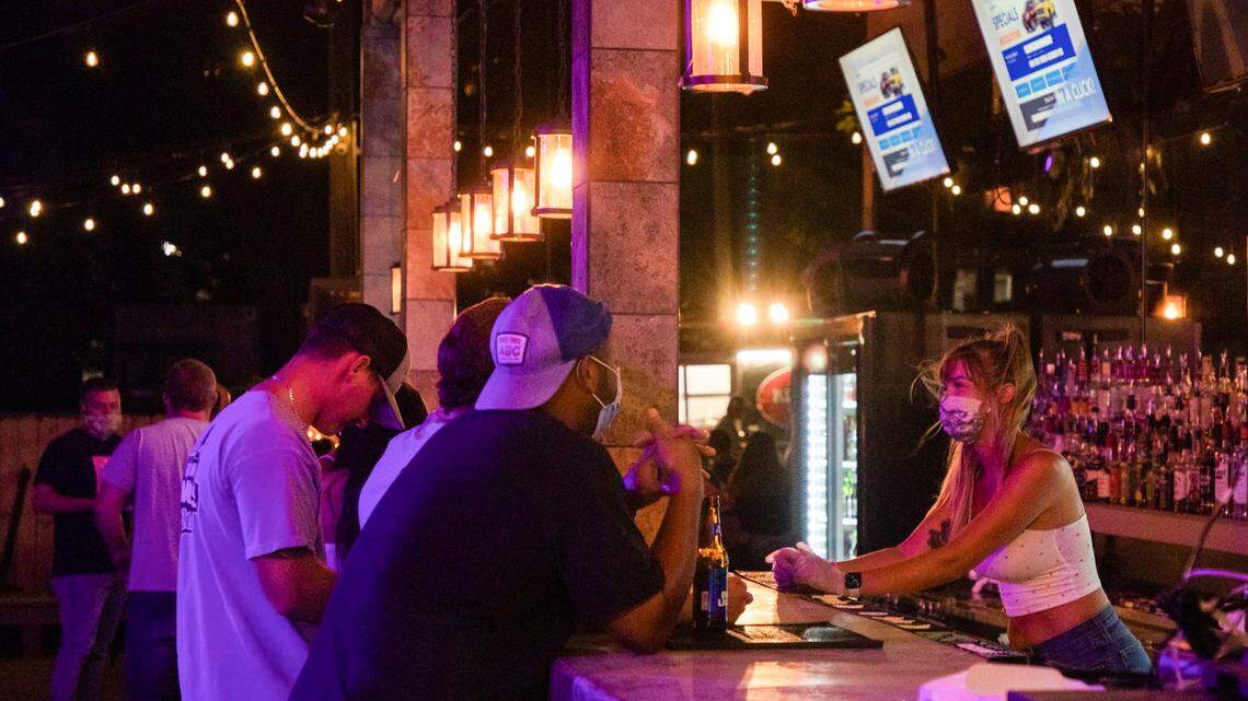 The Cornerstone Tavern on Glenwood Avenue, opened its doors for business despite Gov. Roy Cooper’s veto of legislation to reopen bars and a judge’s decision hours earlier denying a lawsuit brought against the governor’s executive orders by the N.C. Bar and Tavern Association, on Friday, Jun. 26, 2020, in Raleigh, N.C. 