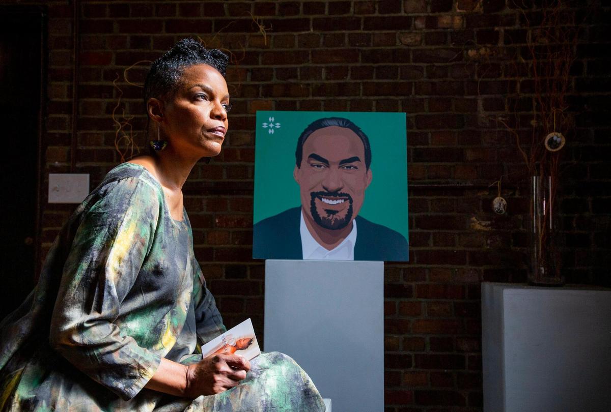 Nnenna Freelon sits for a portrait on Tuesday, May 18, 2021, in the NorthStar Church of the Arts in Durham, N.C. that she and her late husband, Phil Freelon, created. She holds her new album “Time Traveler,” which reflects on her love and life with Phil, who died in 2019 from ALS.