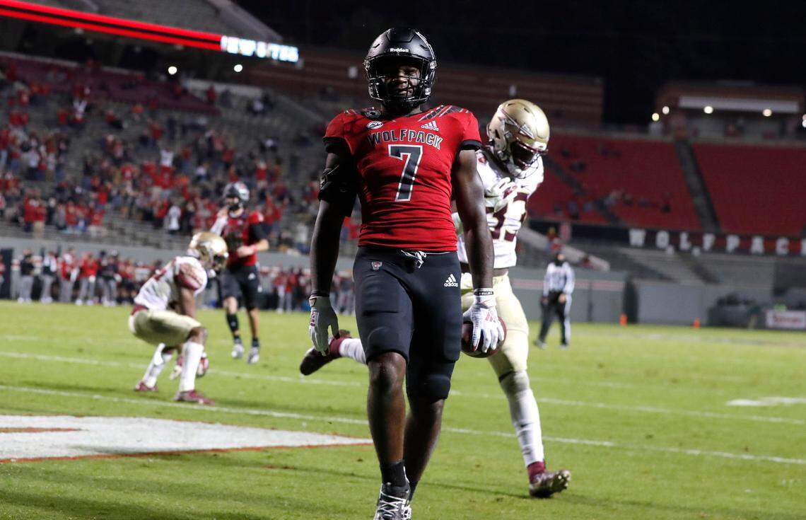 N.C. State running back Zonovan ‘Bam’ Knight (7) runs into the end zone on 18-yard touchdown run during the second half of N.C. State’s 38-22 victory over Florida State at Carter-Finley Stadium in Raleigh, N.C., Saturday, Nov. 14, 2020.