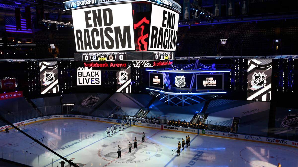 An “End Racism” message is displayed before Game 3 of an NHL hockey second-round playoff series between the Tampa Bay Lightning and the Boston Bruins, Wednesday, Aug. 26, 2020, in Toronto.