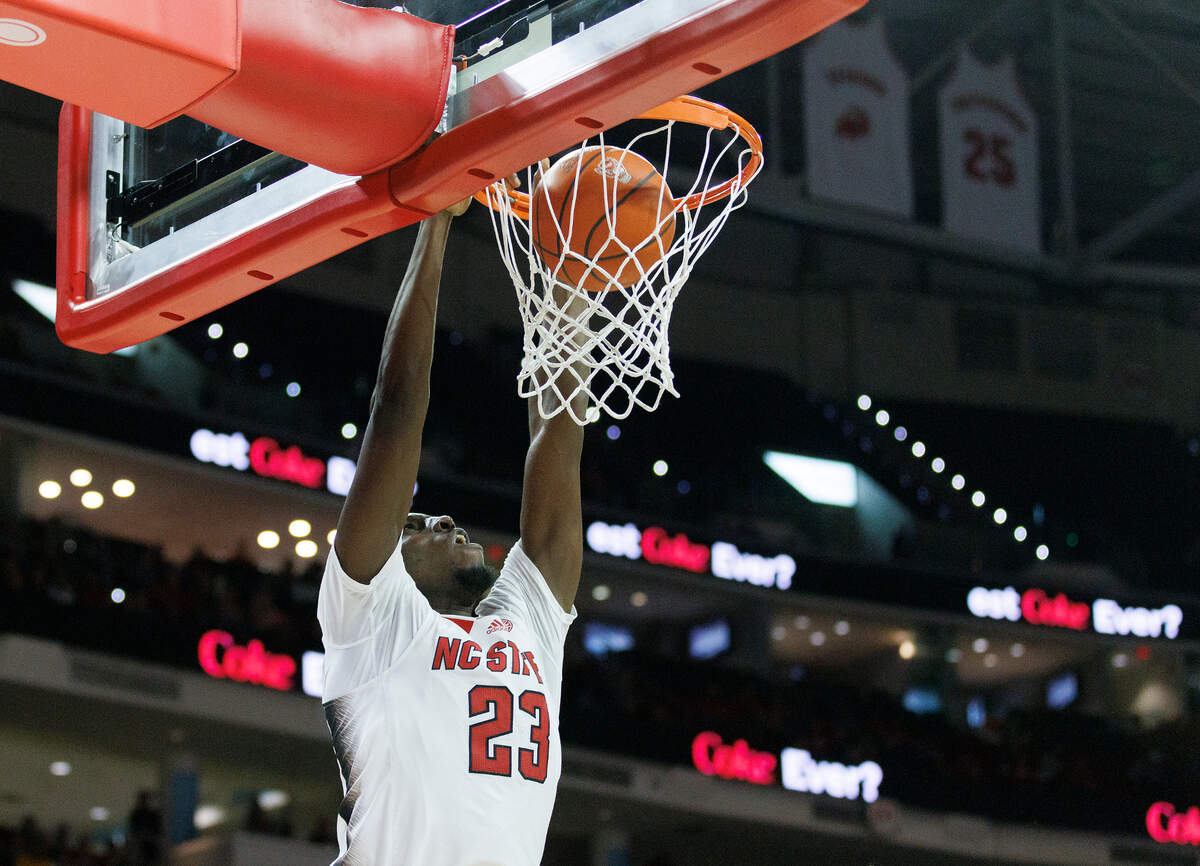 N.C. State’s Mohamed Diarra slams in two during the second half of the Wolfpack’s 74-68 win over Miami on Tuesday, Jan. 30, 2024, at PNC Arena in Raleigh, N.C.