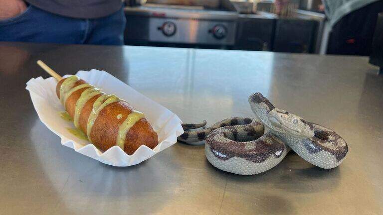 I tried the new rattlesnake corndog at the NC State Fair. Here’s what I thought.
