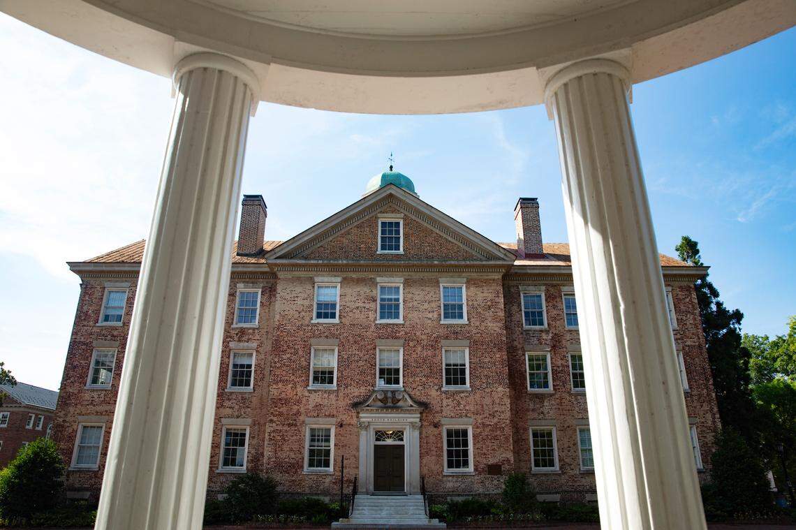 UNC’s South Building is framed by columns of the Old Well on the Chapel Hill campus.