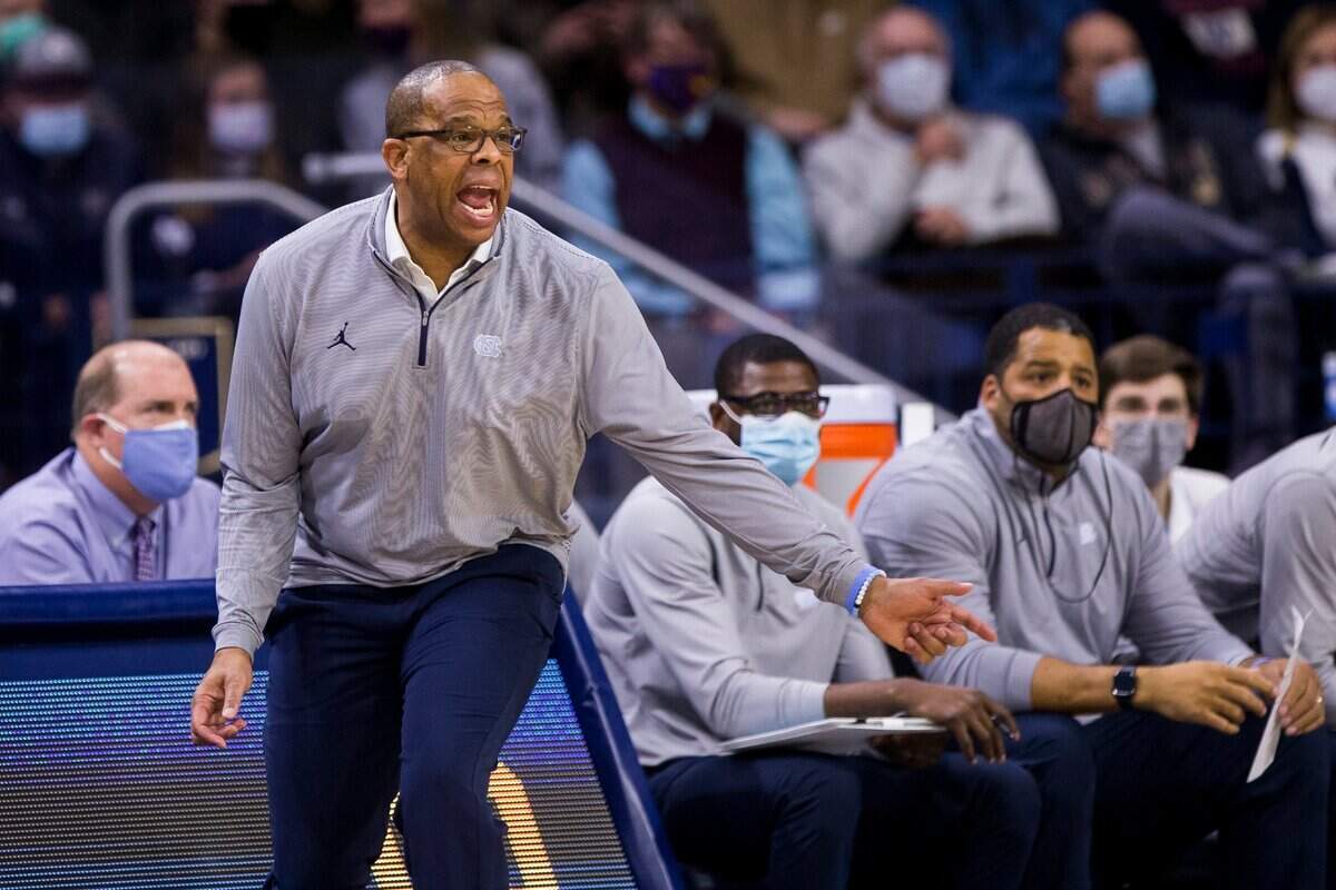 North Carolina head coach Hubert Davis yells to players during the second half of an NCAA college basketball game against Notre Dame on Wednesday, Jan. 5, 2022, in South Bend, Ind. (AP Photo/Robert Franklin)