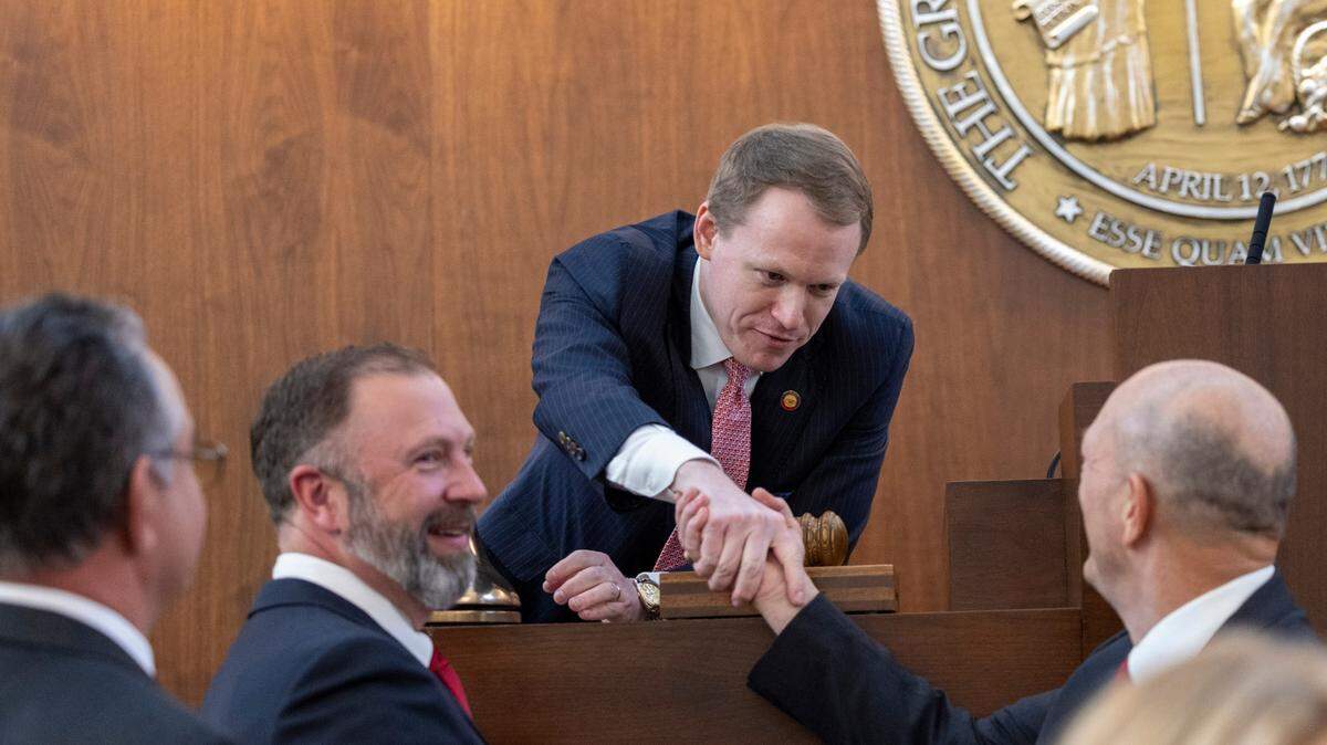 Lawmakers congratulate newly elected House Speaker Destin Hall after the North Carolina General Assembly convened for its 2025 legislative session on Wednesday, Jan. 8, 2025, at the Legislative Building.