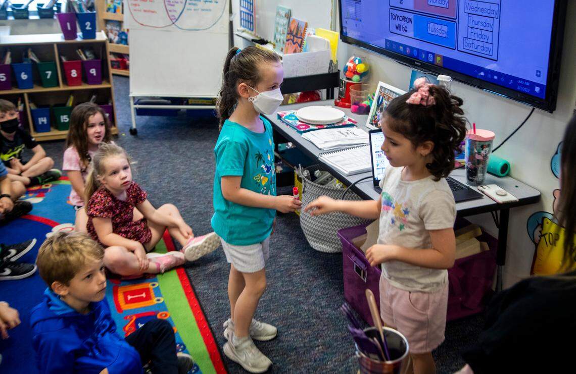 Most students in Holly Berk’s kindergarten class elected not to wear masks Monday, March 7, 2022 at Scotts Ridge Elementary in Apex. Monday marked the first day that face masks are now optional in Wake County schools.