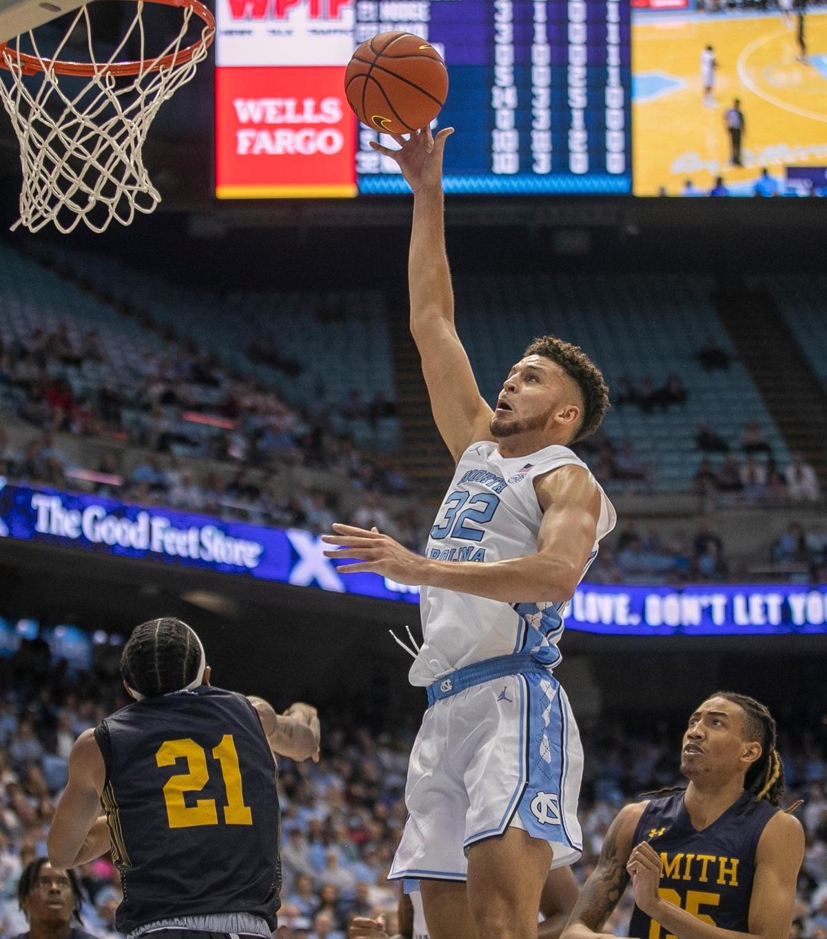 North Carolina’s Pete Nance (32) puts up a shot over Johnson C. Smith’s Nilous Hodge Jr. (21) in the first half during an exhibition game on Friday, October 28, 2022 at the Smith Center in Chapel Hill, N.C. Nance scored 19 points.