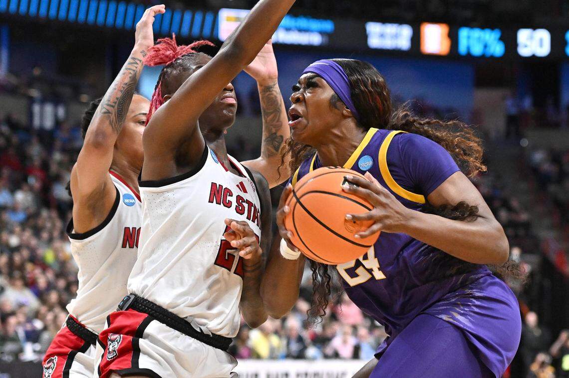 LSU Lady Tigers forward Aneesah Morrow (24) shoots against NC State Wolfpack guard Saniya Rivers (22) during the first half of a Sweet 16 NCAA Tournament basketball game at Spokane Arena.