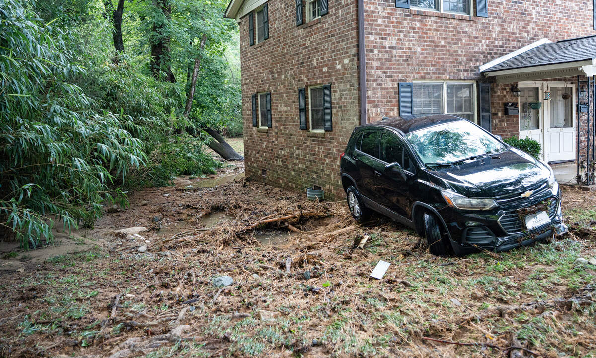 Debris lie by an apartment complex in Chapel Hill, N.C. on Monday, July 7, 2025 after Tropical Storm Chantal brought rain and flooding the previous day. The flooding set cars, metal dumpsters and other debris afloat the night of July 6, 2025.