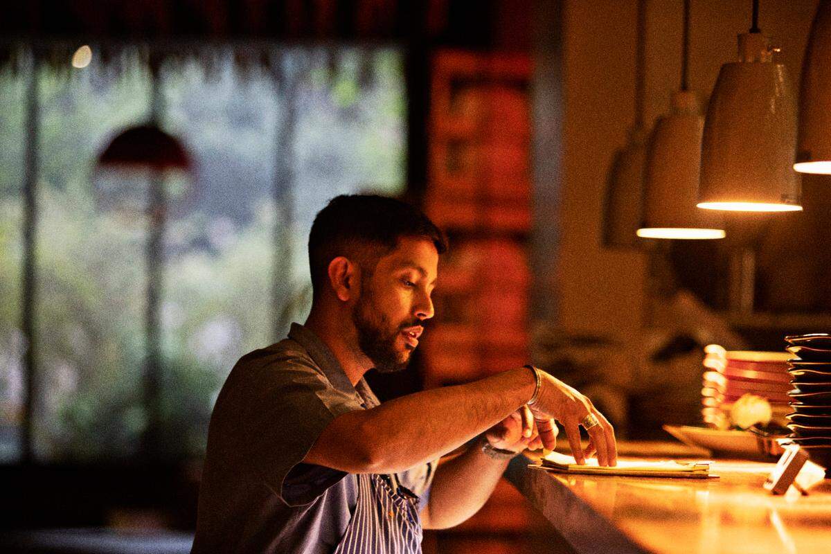 Raleigh chef Saif Rahman, pictured here at his former restaurant Vidrio, will open Peregrine, the first restaurant of his own with Patrick Shanahan, next year in North Raleigh.