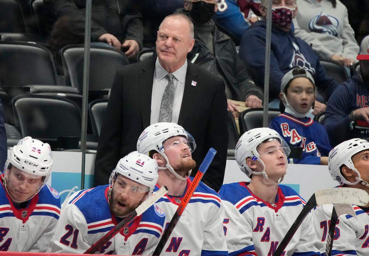 New York Rangers head coach Gerard,r ear, Gallant looks on during the second period of an NHL hockey game against the Colorado Avalanche, Tuesday, Dec. 14, 2021, in Denver. (AP Photo/David Zalubowski)