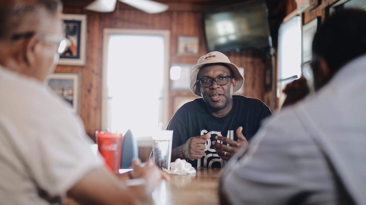 Ricky Moore talks coastal fish traditions while eating fried croaker at Sam & Omie’s restaurant in Nags Head, N.C. in “The Hook,” a half-hour show premiering at 10 p.m. Oct. 17 on UNC-TV.