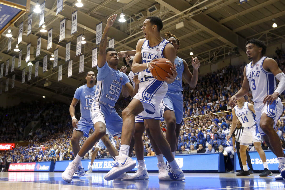 Duke’s Justin Robinson (50) pulls in a rebound during the Duke Blue Devils’ 89-76 victory over the North Carolina Tar Heels at Cameron Indoor Stadium in Durham, N.C., Saturday, March 7, 2020.