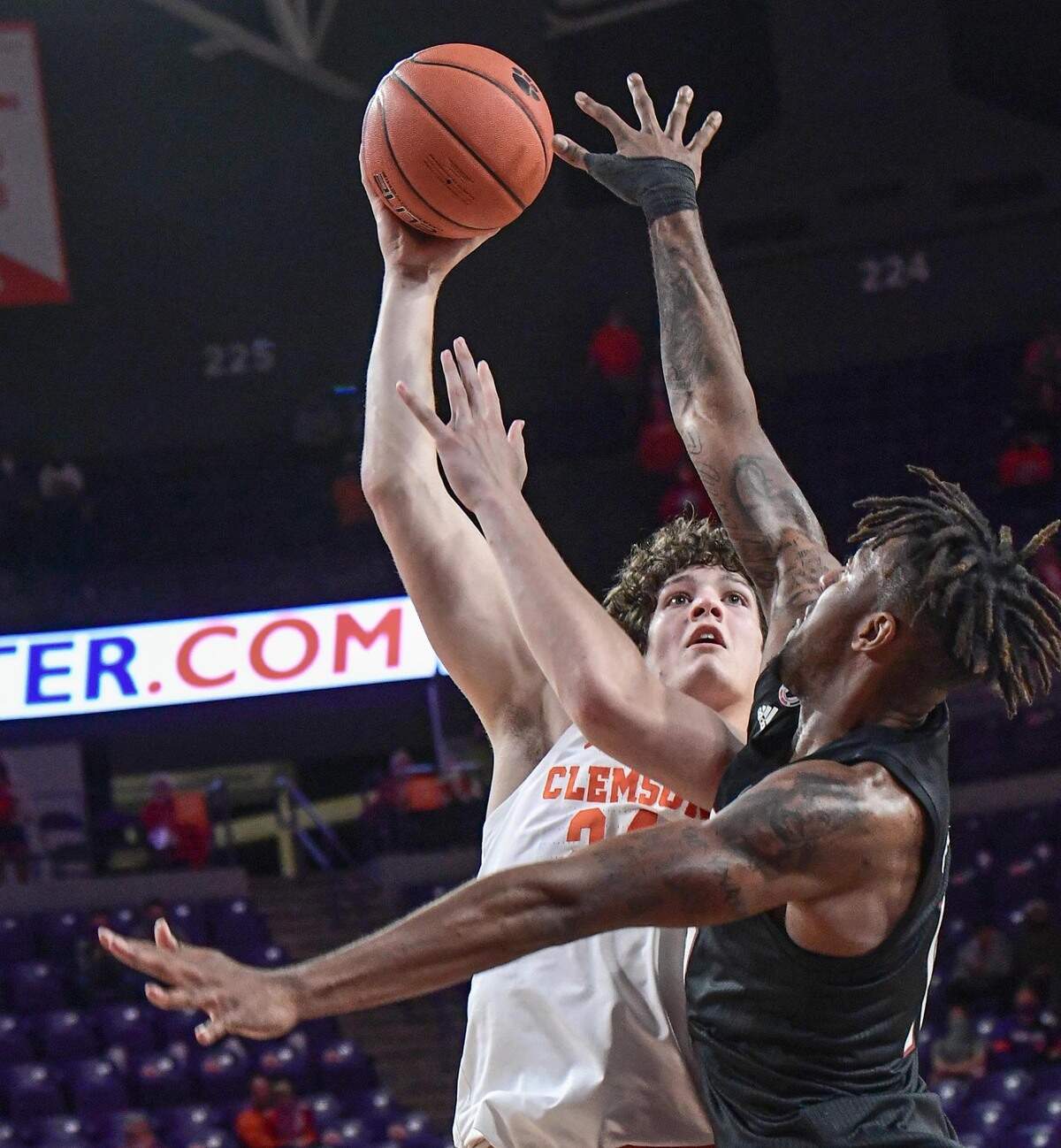 Clemson freshman forward PJ Hall(24) makes the last shot of the game during the Tigers’ victory over N.C. State January 5, 2021.