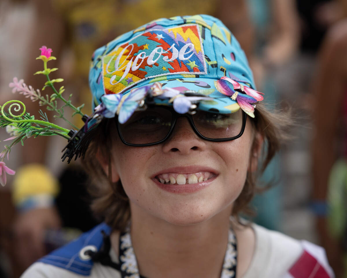 Fans of all ages line the rail for Goose concerts.