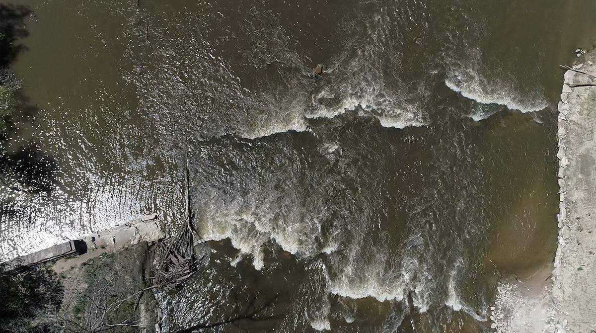 An aerial view of the rapids located where the Milburnie Dam  was located on the Neuse River in Raleigh,N.C., Wednesday, May 2, 2018.