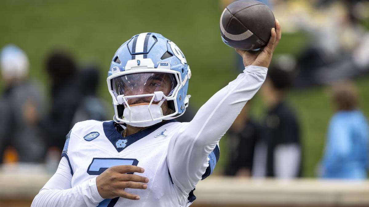 North Carolina quarterback Gio Lopez (7) warms up for the Tar Heels’ game against Wake Forest on Saturday, November 15, 2025 at Allegacy Stadium in Winston-Salem, N.C.