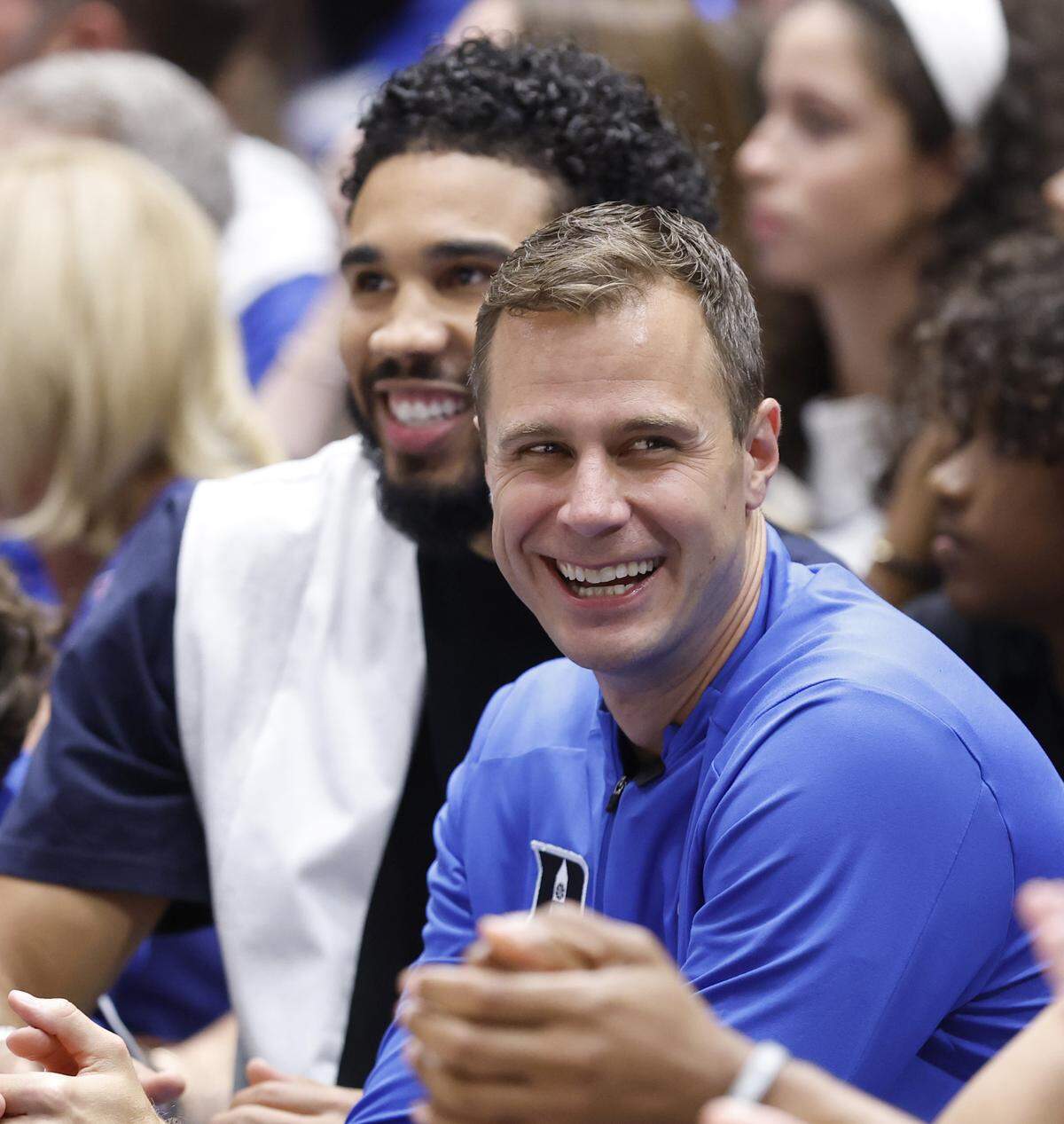 Duke head coach Jon Scheyer laughs while sitting with Jayson Tatum during Duke basketball’s Countdown to Craziness at Cameron Indoor Stadium in Durham, N.C., Friday, Oct. 3, 2025.