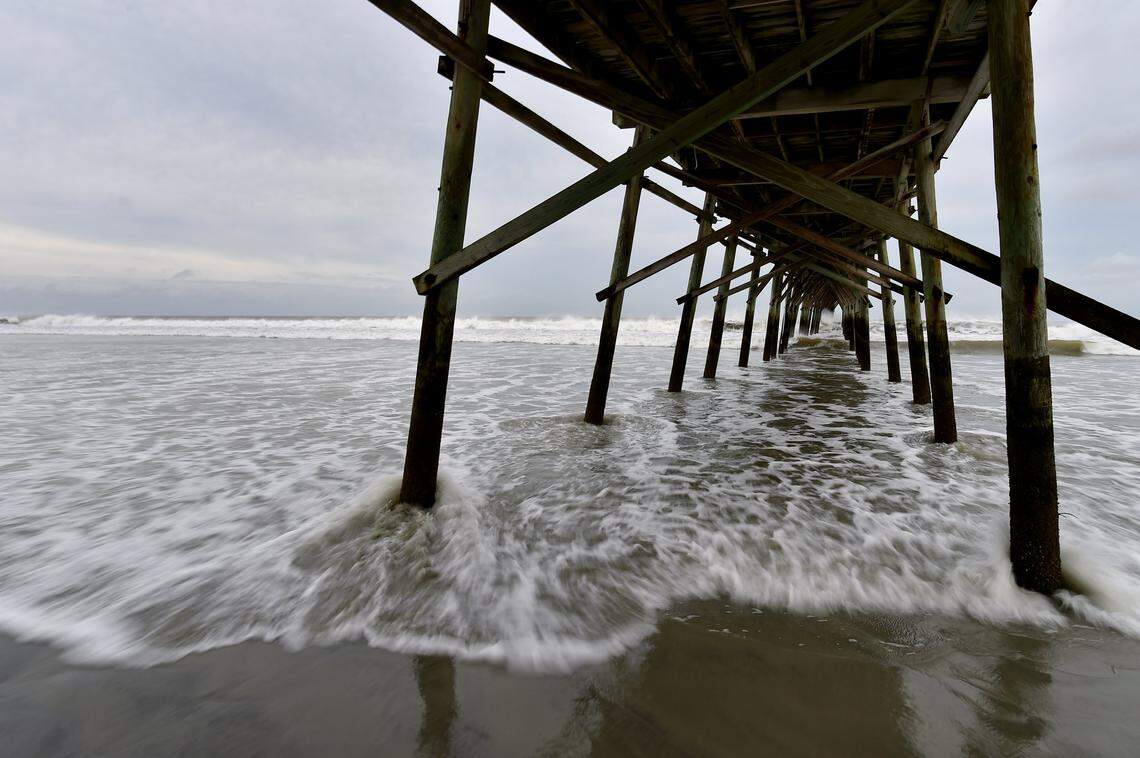 Winds and the surf began picking up Thursday morning at Sunset Beach Fishing Pier, in the town of Sunset Beach. Hurricane Florence is expected to make landfall Friday.