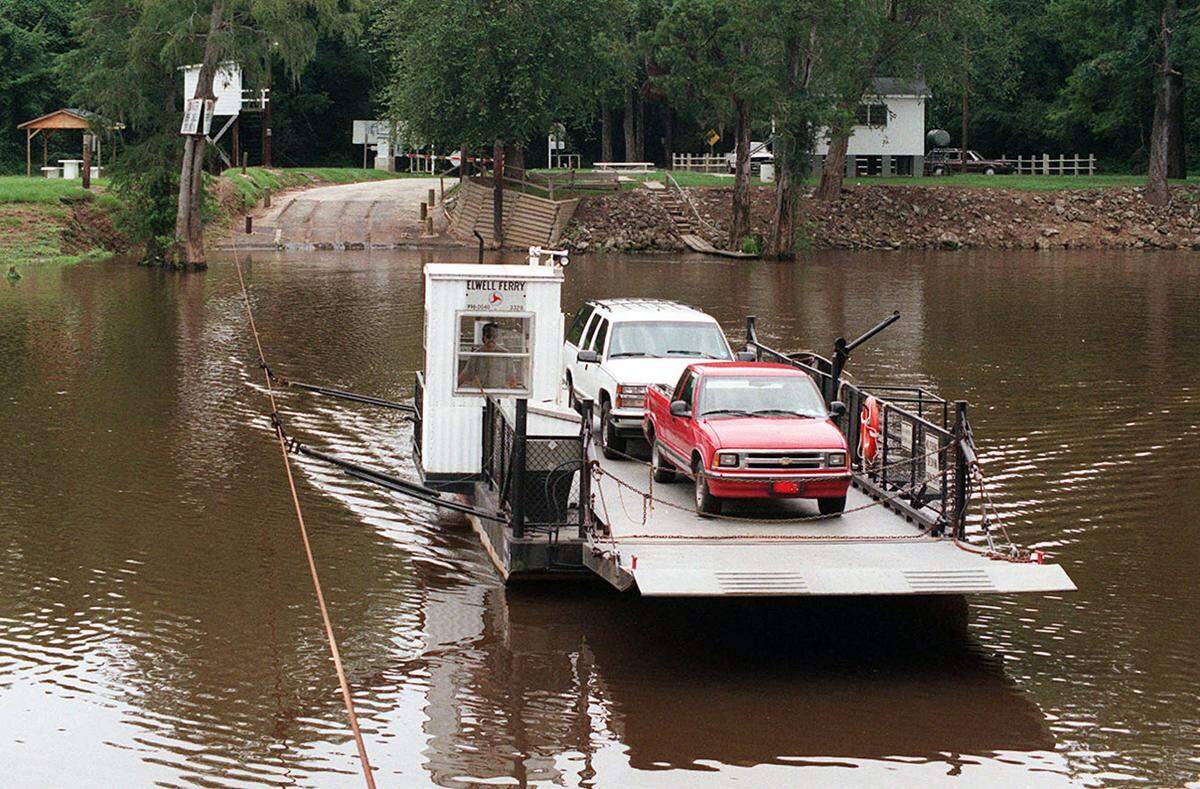 The Elwell Ferry crosses the Cape Fear River south of Elizabethtown in this file photo from August 1996. The ferry connects the communities of Carvers and Kelly in Bladen County.