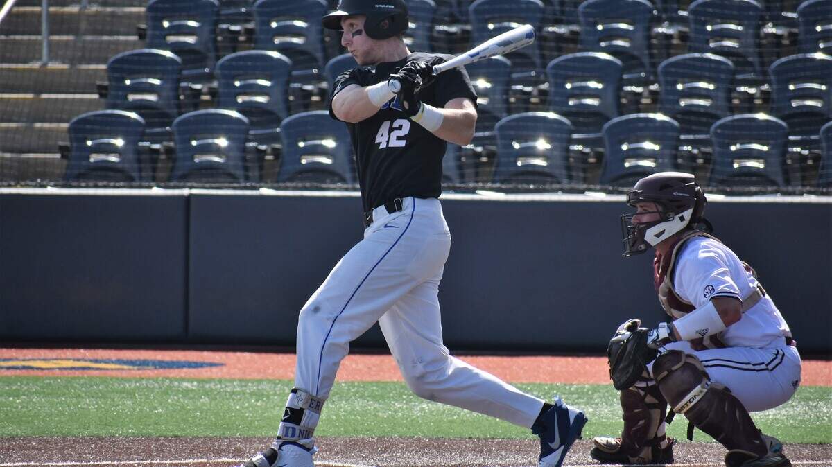 Duke’s Erikson Nichols slams a three-run home run during a four-run fourth-inning rally as the Blue Devils beat Texas A&M, 8-5, in the NCAA baseball tournament Morgantown Regional on Friday.