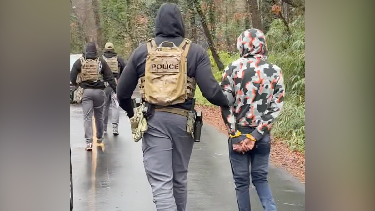 Northgate Park resident Alisa Cullison confronted and recorded masked federal officers who took three men into custody in her Durham neighborhood. Two men were removed from a vehicle and one from a home on Thursday morning, she and a neighbor said.