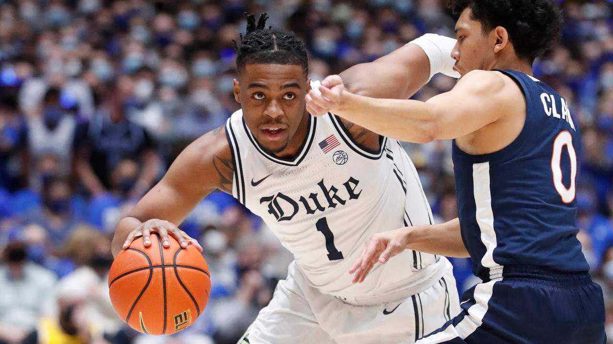 Duke’s Trevor Keels (1) drives as Virginia’s Kihei Clark (0) defends during Duke’s game against Virginia at Cameron Indoor Stadium in Durham, N.C., Monday, Feb. 7, 2022.