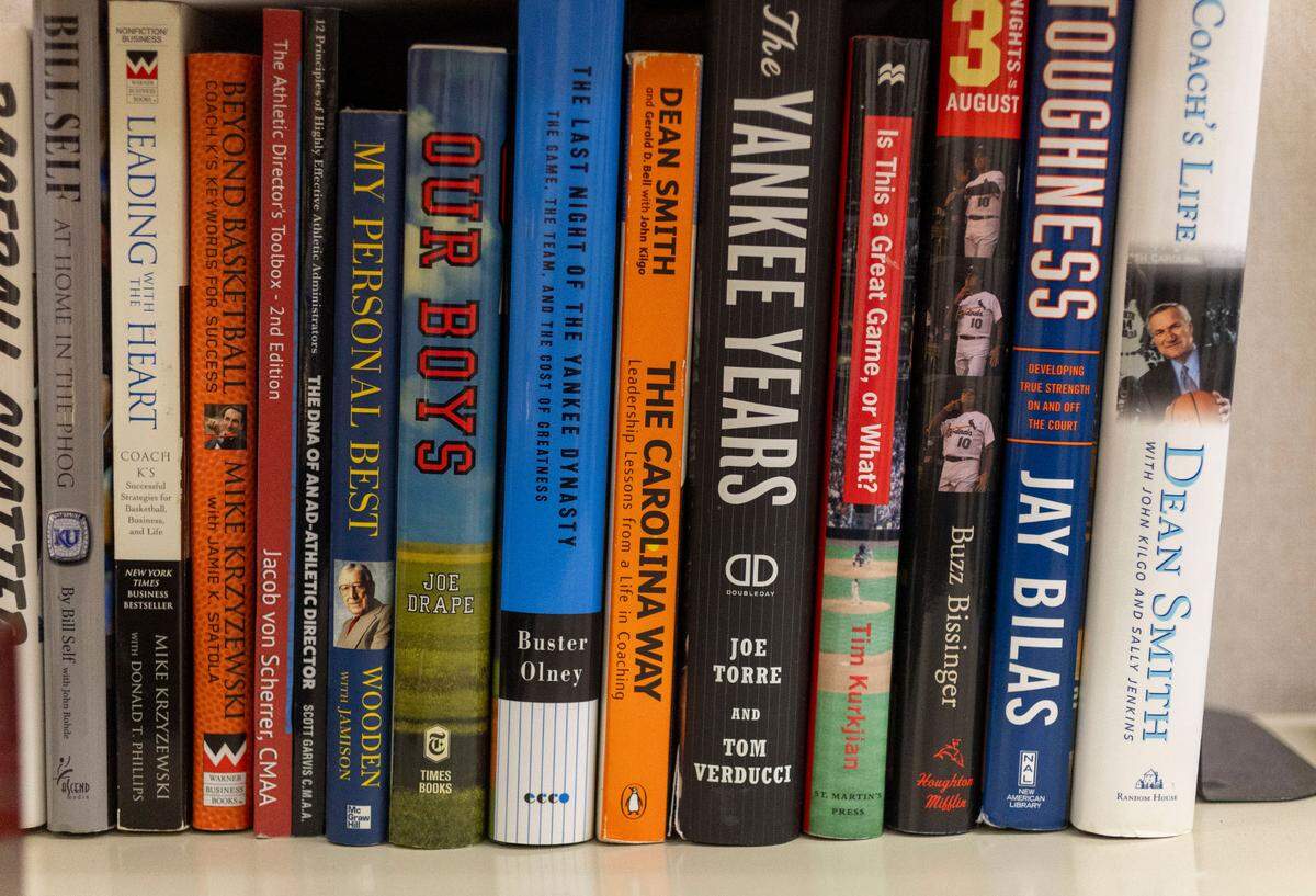 Books belonging to Emporia High School athletic director Beau Welch feature volumes by Dean Smith and Mike Krzyzewski.  