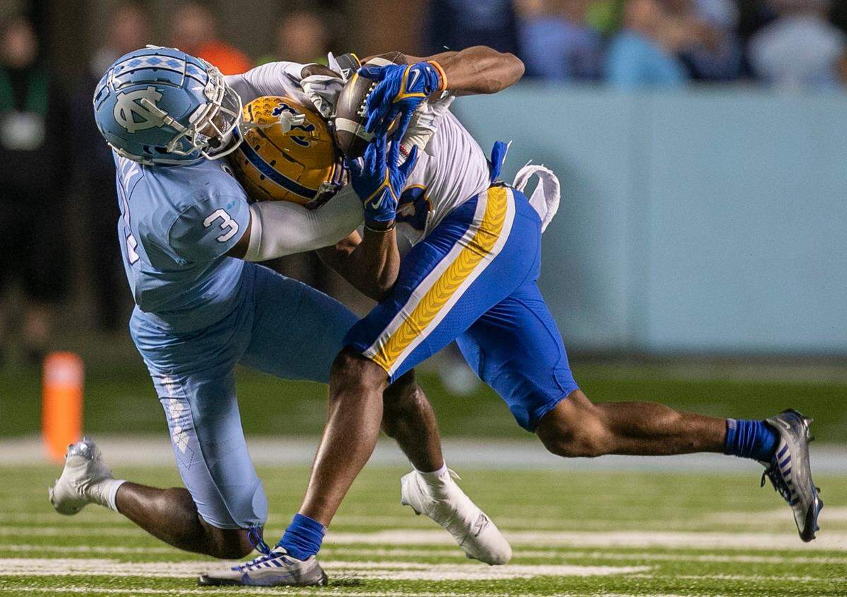 North Carolina’s Storm Duck breaks up a pass intended for Pitt’s Jared Wayne (5) on fourth down in the fourth quarter, turning the ball over to the Tar Heels on Saturday, October 29, 2022 at Kenan Stadium in Chapel Hill, N.C.