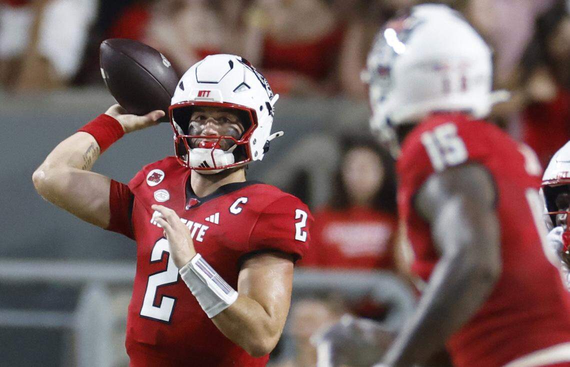 N.C. State quarterback Grayson McCall (2) passes to tight end Justin Joly (15) during the first half of N.C. State’s game against Western Carolina at Carter-Finley Stadium in Raleigh, N.C., Thursday, August 29, 2024.